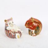 A Crown Derby squirrel with a gold stopper, a Crown Derby cat with a silver stopper, squirrel height