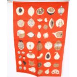 A Vintage Irish linen tea towel, designed by Lucienne Day, red ground with designs of fruit and fish
