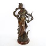 After Louis Moreau, an Art Nouveau patinated spelter sculpture, "Terpsichore", signed, height 61cm