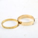 A 9ct rolled gold engraved bangle, and a gilded bangle