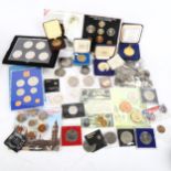 Various world coins, including American silver half dollar, United Kingdom uncirculated coin