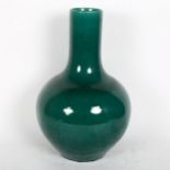 A large Chinese green crackle glaze bottle vase, 6 character mark on base, height 34cm There are