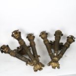 A large and heavy pair of cast-iron Rococo style 3-branch torch wall lights, height 60cm (1