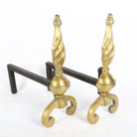 A pair of cast-brass fire dogs, height 37cm