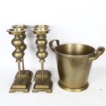 A set of 4 brassed aluminium candle stands, and a similar 2-handled waste paper bin, height 27cm