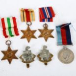 A group of 4 Second World War Service medals, unnamed, comprising 1939 - 45 Star, Africa Star, Italy