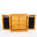 A Thomas Pacconi Classics jewellery box, 2 doors opening to reveal fitted drawer interior, height