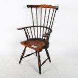 A miniature doll's Windsor elbow chair, height 38cm