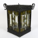 A large stained and cut-glass square-section lantern shade, with embossed frame and leadlight