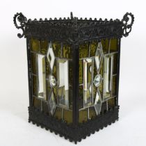 A large stained and cut-glass square-section lantern shade, with embossed frame and leadlight