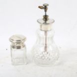 A glass and sterling silver-mounted atomiser, and a silver-topped dressing table bottle (2)
