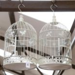 A pair of modern painted wirework metal bird cages, height 50cm