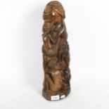 A heavy African Tribal carved hardwood figural sculpture, height 44cm