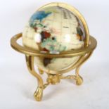A large reproduction terrestrial globe on stand, width 45cm