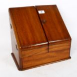 An Edwardian mahogany stationery box, with glass inkwells and pen tray, W33cm, H30cm, D21cm