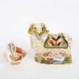A Royal Crown Derby humming bird with a gold stopper, and a Royal Crown Derby ram with a gold