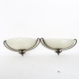 A pair of Hollywood Regency frosted glass urn wall lights, width 40cm