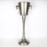 A stainless steel pedestal Champagne bucket, height 77cm