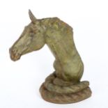 A cast-iron horse-head door stop, height 24cm