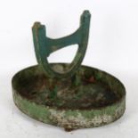 A green painted cast-iron boot scraper, length 33cm, height 25cm