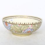 A large 1930s Crown Ducal fruit bowl, designed by Charlotte Rhead, in 4300 Tudor Rose pattern,