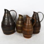 4 coopered oak Continental jugs with copper and brass bands, tallest 30cm