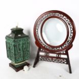 A large Chinese Archaic style patinated metal square-section lamp, and a Hong Mu swivel circular