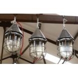 A set of 3 polished metal bulkhead lantern, Honex glass bowls, length 40cm