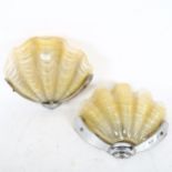 A pair of Art Deco shell design wall lights with chrome mounts