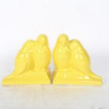L Fontinelle, Italy, a pair of yellow crackle glazed dove bookends, painted mark, height 16cm