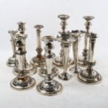 A group of Antique silver plate on copper candlesticks, and a pair of plated vases (11)