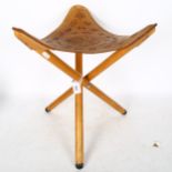 A Godber's Indian arts stool, with tooled leather seat, height 46cm