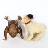 An early 20th century straw-filled dog, and an unusual pottery study of a bat