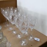 A set of 6 cut-glass red wine glasses, with tapered stems, and a set of 6 cut-glass white wine