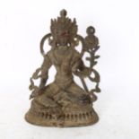 A Chinese patinated bronze seated deity, on double lotus base, height 22cm