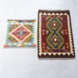 A Chobi Kilim mat, 46cm x 49cm, and a Maimana Kilim mat, 82cm x 55cm (2)