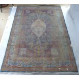 An Antique Persian Keshan carpet, 280cm x 188cm