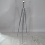 A contemporary chrome rocket standard lamp, on tripod base, H144cm