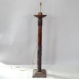 A carved mahogany torchere converted to a standard lamp, height to bayonet fitting 154cm