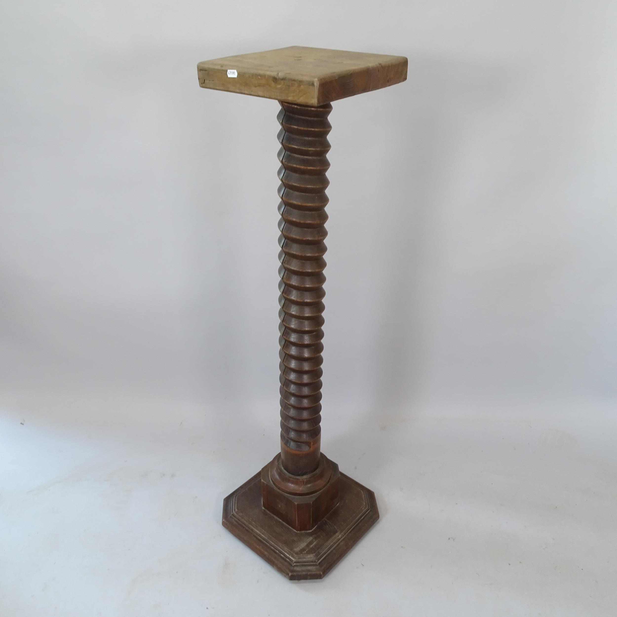 A French oak spiral turned pedestal, 38cm x 126cm