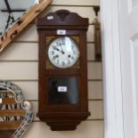 A Vintage stained oak 8-day drop-dial wall clock, case height 55cm, with pendulum
