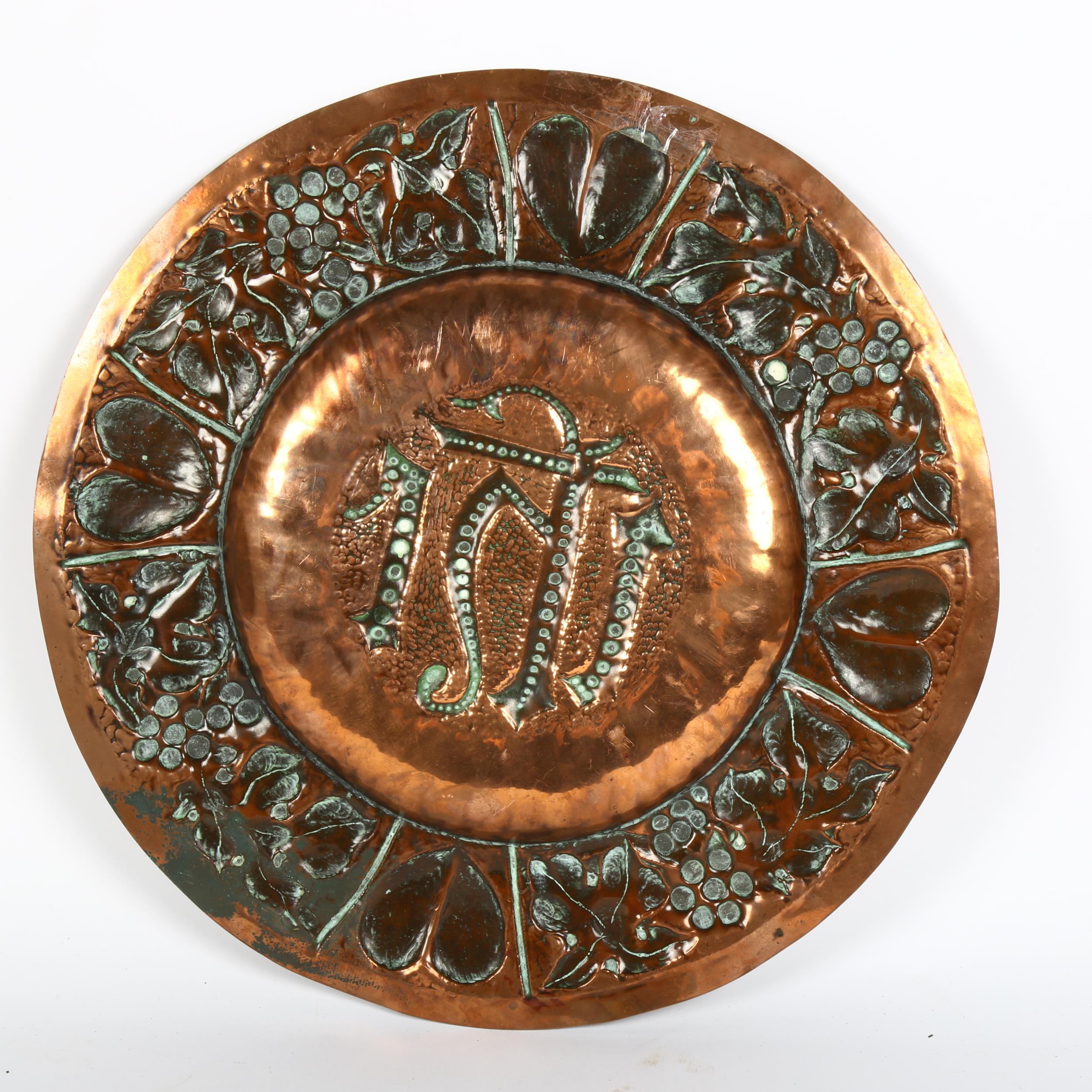 A Gothic Art Nouveau copper church alms plate, relief embossed heart and grapevine surround, - Image 2 of 2