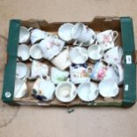 A box of 19th century and later moustache cups