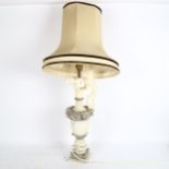 A carved alabaster table lamp and shade, height 76cm