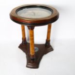 A Franklin Mint Royal Geographical Society circular occasional table, with an inset clock top (