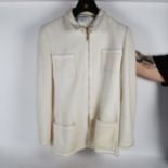 A Chanel Boutique Vintage jacket and hanger