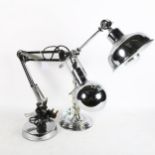 A pair of modern chrome anglepoise lamps