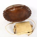 A Papua New Guinea operculum and hardwood bowl, and a Ethiopian vellum satchel, bowl diameter