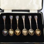 A set of 6 Elizabeth II silver coffee spoons, with St Andrews enamelled golfing finials,