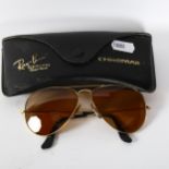 A pair of Ray Ban Driving Series sunglasses, the bridge engraved B&L Ray-Ban 5814, with case